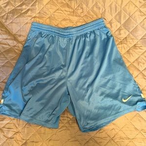 Nike Dri-Fit 5in inseam running shorts, light blue
